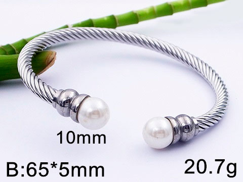 Brazalete plateado con perlas