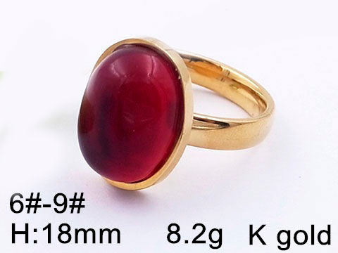 Anillo dorado piedra vinotinto