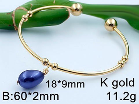 Set dorado Brazalete y aretes perla azul