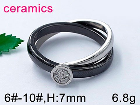 Anillo plateado y cerámica negra y fina pedrería