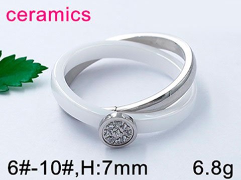 Anillo plateado y cerámica blanca y fina pedrería