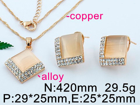 Set dorado aretes y dije rombo con pedrería