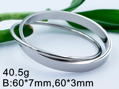 Brazalete plateado entrelazado 6cm