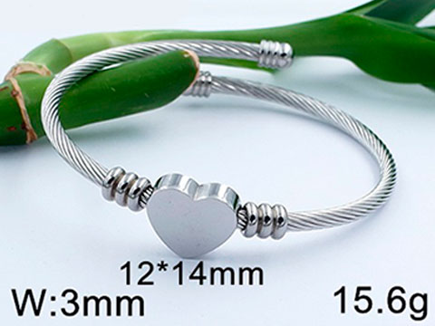 Brazalete plateado charm corazón al centro