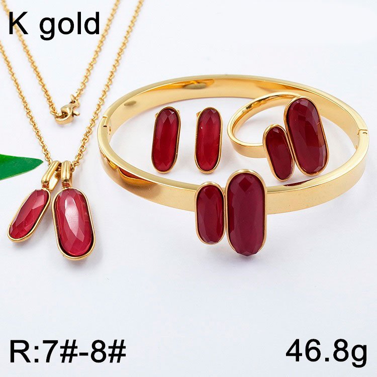 Set dorado 4 piezas dijes piedra roja anillo#8