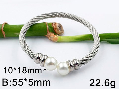 Brazalete plateado entorchado perlas en puntas
