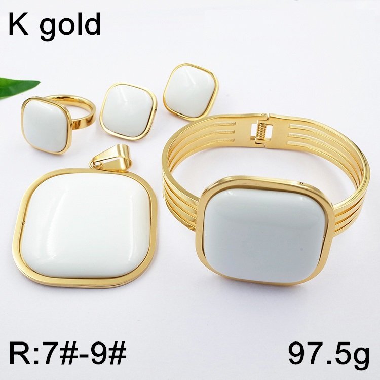 Set dorado 4 piezas piedra blanca anillo