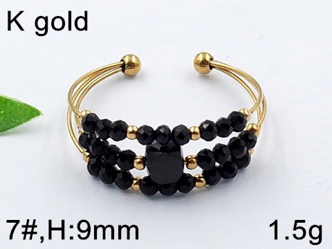 Anillo dorado abierto cristales negros