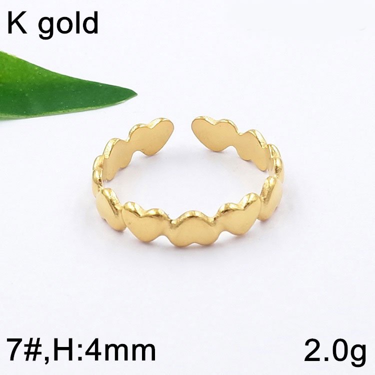 Anillo dorado abierto corazoncitos continuos