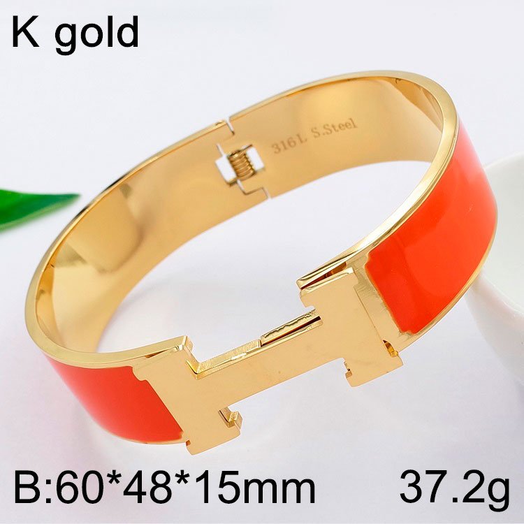 Brazalete ancho dorado y anaranjado abertura al frente