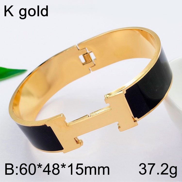 Brazalete ancho dorado y negro abertura al frente
