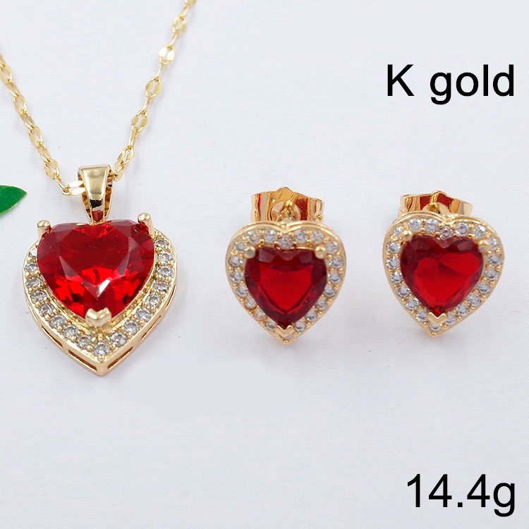 Set dorado corazón dije y aretes piedra roja