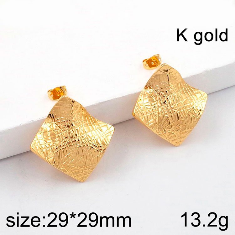 Aretes dorados (Laminado americano) 2.9cm ondulado con textura
