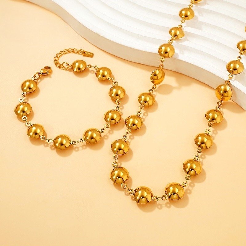 Set dorado collar 45cm y pulsera botón 4mm