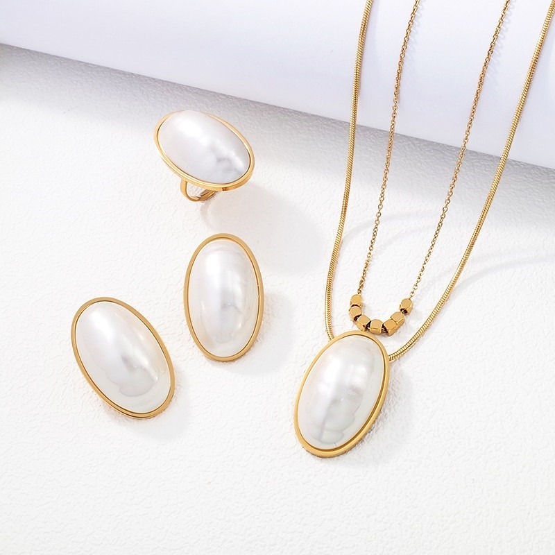 Set dorado Collar, aretes y anillo perla ovalada Talla 7